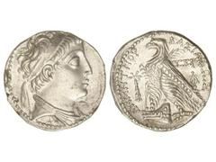 Tetradracma. 129-125 a.C. DEMETRIO II. REINO SELÉUCIDA. TIRO. Anv.: Busto revestido y diademado a derecha. Rev.: Águila en pie a izquierda, sobre proa de nave, alrededor leyendas y monogramas. 14,08 g