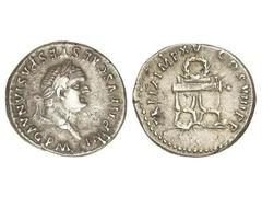 Denario. Acuñada el 79-80 d.C. TITO. Anv.: IMP. TITVS CAES. VESPASIAN. AVG. P. M. Cabeza laureada a derecha. Rev.: TR. P. IX IMP. XV COS. VIII P. P. Guirnalda y silla curul. 3,47 grs. AR. (Pequeña gri