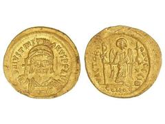 BYZANTINE COINS Sólido. JUSTINIANO I (527-565 d.C.). ¿SICILIA? . Anv.: D. N. IVSTINIANVS P. P. AVG. Busto de frente con globo crucífero. Rev.: VICTORIA AVGGG LB. En exergo: CONOB. Ángel en pie de fren