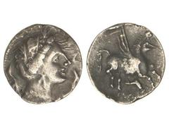 CELTIBERIAN COINS DRACMA . DRACMA IBÉRICA DE IMITACIÓN EMPORITANA . Anv.: Cabeza femenina a derecha, de tamaño pequeño, rodeada por tres delfines. Rev.: Pegaso a derecha, con la cabeza modificada, deb