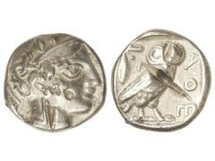 Tetradracma. 480-407 a.C. ATENAS. Anv.: Cabeza de Atenea a derecha con casco. Rev.: Lechuza en pie a derecha, detrás creciente y rama de olivo. 17,11 grs. AR. Marcas y golpes de cizalla en anverso y r