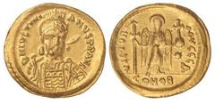 BYZANTINE COINS Sólido. JUSTINIANO I (527-565 d.C.). CONSTANTINOPLA. Anv.: D. N. IVSTINIANVS P. P. AV¶. Busto de frente con casco, lanza y escudo. Rev.: VICTORIA AVCCC¶. En exergo: CONOB. Ángel en pie