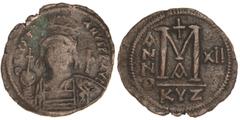 BYZANTINE COINS Follis. JUSTINIANO I (527-565 d.C.). CYZICUS. Anv.: D. N. IVSTINIANVS P. P. AVG. Busto de frente con casco, escudo y globo crucífero. Rev.: M encima cruz, debajo A, a los lados A / N /