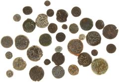 Ancient coins in lots - A collection of bronze coins struck on Cyprus, mainly Ptolemaic but also some older: 3 x AE11/12 from Timocharis (mint Marion), Alexander III (3 x AE8/10, 1 x AE20 (Amathus) an