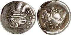 KELTEN DONAUKELTEN / OSTKELTEN. Typ Philippos II. von Makedonien. "Sattelkopfpferd-Typ" Stater 7,19g. Stilisierter Zeuskopf mit schleifenförmigen Haarlocken n.r. / Reiter n.l. symbolisiert mit 5 Punkt