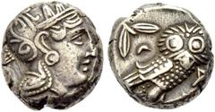 GRIECHISCHE MÜNZEN ATTIKA ATHEN Tetradrachmon, ca. 317-229 v. Chr. Kopf der Athena in einem mit Palmen geschmückten Helm n. r. Rv. Eule n. r., Kopf frontal, im Felde oben l. Ölzweig und Mondsichel. 17