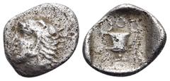 Greek AKARNANIA. Uncertain mint. Circa 420-380 BC. Diobol (Silver, 11 mm, 0.68 g, 3 h). Head of youthful Herakles to left, wearing lion's skin headdress. Rev. Δ-Ι-Ο (= diobol) Kantharos; all within in