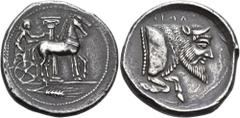 The Richard Eidswick Collection of Greek Coins SICILY. Gela. Circa 465-450 BC. Tetradrachm (Silver, 28 mm, 15.58 g, 7 h). Charioteer, holding the reins in his right hand and a goad in his left, drivin