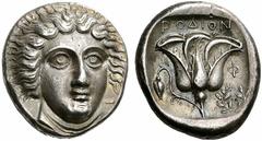 Coins of the Greeks Islands off Caria Rhodos. Rhodes . Circa 404-385 BC. Tetradrachm (Silver, 15.24 g 12). Head of Helios facing, turned slightly to the right. Rev. RODION Rose with bud to left; to ri