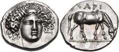 Greek THESSALY. Larissa. Circa 400 BC. Drachm (Silver, 20.5 mm, 6.06 g, 7 h). Head of the nymph Larissa facing, turned slightly to the right, wearing ampyx. Rev. ΛΑΡΙ Horse grazing right. BCD II, 240 