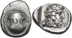 Greek BOEOTIA. Thebes. Circa 425-395 BC. Stater (Silver, 24.5 mm, 12.07 g, 3 h). Boeotian shield. Rev. Θ-Ε Bearded head of Dionysos to right, wearing ivy wreath. BCD Boiotia 438 (same dies). & 623h (t
