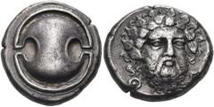 Greek BOEOTIA. Thebes. Circa 405-395 BC. Stater (Silver, 22 mm, 11.91 g). Boeotian shield. Rev. Θ - Ε Bearded head of Dionysos, three-quarters facing, turned slightly to right, wearing ivy wreath. BCD