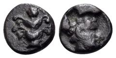 Greek KYRENAIKA. Kyrene. Circa 480-435 BC. Hemiobol (Silver, 6.2 mm, 0.32 g, 9 h). Silphium plant with flower, four leaves and four fruits. Rev. Head of Zeus Ammon to right with horn of ram; all withi