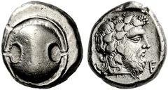 Coins of the Greeks Boeotia Thebes. Circa 425-395 BC. Stater (Silver, 12.17 g). Boeotian shield. Rev. Q – E Head of Dionysos to right, bearded and wearing an ivy wreath. BCD Boiotia 442/4 var. ( diffe