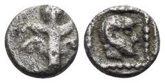 Greek KYRENAIKA. Kyrene. Circa 480-435 BC. Hemiobol (Silver, 6 mm, 0.31 g, 9 h). Silphium plant with four leaves (two on each side) and flower at top. Rev. Head of Zeus Ammon to right, with ram's horn