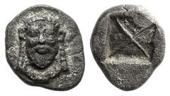 GREEK COINS Thraco-Macedonian Region Uncertain Tribe. Circa 480 BC. Diobol (Silver, 1.02 g). Bust of Dionysos facing, with long hair falling down behind his ears, a short pointed beard, a full mustach