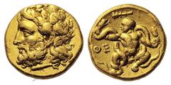 GREEK COINS Boeotia -. Circa 395 BC. Drachm (Gold, 6.11 g 1). Bearded head of Dionysos to left, wearing ivy wreath. Rev. ΘE The infant Herakles, nude, seated facing and holding a coiling serpent by th