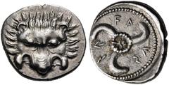 GREEK COINS Dynasts of Lycia. Vekhssere II, circa 410-390/80 BC. Third stater (Silver, 16 mm, 2.84 g). Lion's scalp facing. Rev. Vekhssere in Lycian triskeles turning to left; within central circle, m