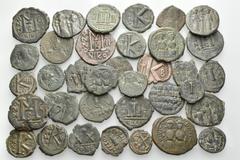 Big Lots BYZANTINE. Early & Middle Byzantine period, circa 5th -12th Century. (Bronze, 300.00 g). An interesting lot of thirty-five Bronze Folles, half Folles and Decanummia from the early and middle 