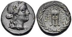 Greek LYDIA. Thyateira. 2nd century BC. (Bronze, 20 mm, 7.40 g, 12 h). Laureate head of Apollo to right. Rev. ΘΥΑΤΕΙΡΗΝΩΝ Filleted tripod with monogram above; all within wreath. BMC 3. GRPC - Lydia 10