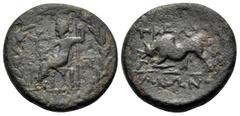 Greek LYDIA. Tralleis. 2nd-1st century BC. (Bronze, 17 mm, 3.65 g, 12 h). Zeus seated to left, holding Nike in right hand and long scepter with left; to right, monogram of ΠΑ; all within wreath. Rev. 