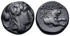 The Vineyard Colection Part IV, Greek LYDIA. Sardes. 2nd-1st centuries BC. (Bronze, 15 mm, 4.17 g, 12 h). Wreathed head of Dionysos to right. Rev. ΣΑΡΔΙΑΝΩΝ Forepart of lion to right; behind, monogram