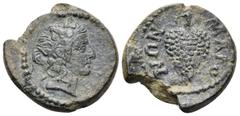 The Vineyard Colection Part IV, Roman Provincial LYDIA. Maeonia. Pseudo-autonomous issue, time of Septimius Severus, 193-211. 1/3 Assarion (Bronze, 15.5 mm, 2.60 g, 12 h). Wreathed head of Dionysos to