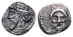 Greek CILICIA. Uncertain. Circa 4th Century BC. Obol (Silver, 10 mm, 0.71 g, 9 h). Turreted and bearded male head of Persian style to left. Rev. Bearded male head facing (Nergal?), with a turreted cro