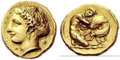 Greek coins Syracuse Double decadrachm circa 405-400, AV 5.79 g. SYP[AKOSIWN] Head of goddess l., hair elaborately waved and caught up behind in star ornamented sphendone, wearing necklace and earring