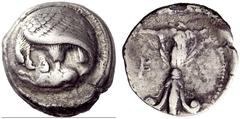 Greek coins Elis Stater circa 421-365, AR 11.72 g. Eagle standing l., grasping the back of a ram with its talons and tearing at its neck with its beak. All on round shield with raised rim. Rev. F – A 