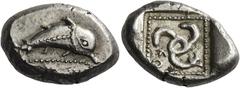 Greek Coins Dynasts of Lycia, Kuprlli, circa 485 – 440. Stater, Aperlai (?) circa 470-440, AR 9.72 g. Dolphin r. above double dotted line; on its body, dotted line. Rev. Triskeles, r. leg ending in gr