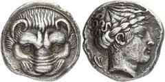 Greek Coins Rhegium Tetradrachm circa 415-400, AR 24 mm, 16.71 g. Lion's mask facing. Rev. PΗΓΙΝΟΝ Laureate head of Apollo r.; behind, two olive leaves. SNG Fitzwilliam 850 (these dies). Kraay-Hirmer 