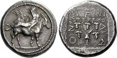 Greek Coins Mende. Tetradrachm circa 460-425, AR 26 mm, 17.23 g. Elderly Dionysus, wearing ivy wreath and himation, reclining on mule's back l., holding cantharus with r. hand and resting l. on the an