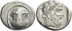 Greek Coins Boeotia, Thebes Stater circa 425-395, AR 22 mm, 11.95 g. Boeotian shield with club across upper half. Rev. [Θ – E] Ivy-wreathed head of Dionysus r.; all within incuse square. Myron Hoard p