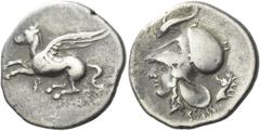 Greek Coins Corinthia, Corinth Stater circa 400-375, AR 24 mm, 8.14 g. Pegasus flying l.; below, koppa. Rev. Head of Athena, wearing Corinthian helmet; dolphin above and head of ketos behind. Ravel 86