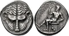 *Greek Coins Bruttium, Rhegium Tetradrachm circa 435-425, AR 27 mm, 17.45 g. Lion's mask facing. Rev. RECINOS Apollo Iocastus seated l., himation over lower limbs; r. hand holding long staff and l. ha