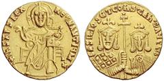 The Byzantine Empire Basil I, 867 – 886 and associate rulers Solidus 867-876, AV 4.43 g. Christ enthroned facing, raising r. hand in benediction and holding Book of Gospel in l. Rev. Facing busts of B