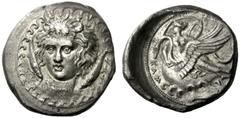 Greek Coins Camarina Didrachm signed by Euainetos before 405, AR 8.55 g. Bust of young river-god Hipparis, facing three-quarters l., with horns on forehead and hair in long loose curls; a fish downwar