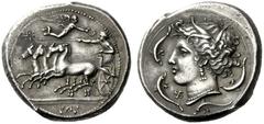 Greek Coins Panormus Tetradrachm circa 340, AR 17.23 g. Fast quadriga driven l. by charioteer, holding reins and kentron , about to be crowned by Nike flying towards him; above outer horse’s head, eig