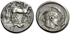 Greek Coins Syracuse Tetradrachm of the Demareteion series circa 465, AR 17.80 g. Slow quadriga driven r. by charioteer, wearing chiton and holding reins in both hands and kentron in l.; above, Nike f
