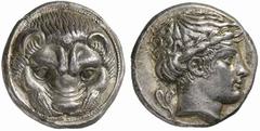 Greek Coins Rhegium No.: 46 Schätzpreis - Estimate CHF 16000 d=25 mm Tetradrachm circa 410-400, AR 16.59 g. Lion’s head facing. Rev. [RHGINON] Laureate head of Apollo r., hair tied and turned up behin