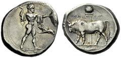 The M.L. Collection of Coins of Magna Graecia and Sicily Poseidonia Nomos circa 400, AR 7.84 g. Poseidon standing r.; chlamys over shoulder, brandishing trident; in r. field, dolphin r. Rev. ΠOΣEI - Δ