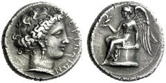 The M.L. Collection of Coins of Magna Graecia and Sicily Terina Nomos circa 380-360, AR 7.49 g. TEPINAIΩN Female head r., hair rendered in elaborate style, wearing earring and necklace. Rev. Nike seat
