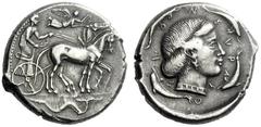 The M.L. Collection of Coins of Magna Graecia and Sicily Syracuse Tetradrachm circa 450, AR 17.37 g. Slow quadriga driven r. by bearded charioteer, wearing chiton and holding kentron and reins; above,