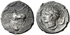 The M.L. Collection of Coins of Magna Graecia and Sicily Syracuse Tetradrachm circa 415-405, AR 16.41 g. Prancing quadriga driven l. by charioteer, holding reins and kentron ; above, Nike flying r. to