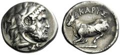 The J. FALM Collection: Miniature Masterpieces of Greek Coinage depicting Animals Euboea, Caristus Drachm circa 369-338, AR 3.77 g. Head of Heracles r. wearing lion’s skin headdress. Rev. KAPYΣ Bull r