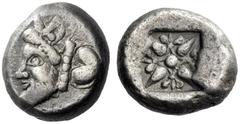 Greek Coins Cyrene Drachm circa 495-475, AR 4.36 g. Head of man-headed bull l; behind, silphium fruit. Rev. Floral pattern set in star formation around a central pellet. All within incuse square. BMC 