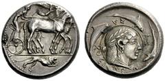 GREEK COINS Syracuse Tetradrachm of the Demareteion series circa 470-460, AR 17.51 g. Slow quadriga driven r. by charioteer, wearing chiton and holding reins in both hands and kentron in l.; above, Ni
