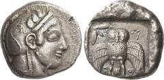 Greek Coins Attica, Athens. Decadrachm, circa 467-465, AR 41.98 g. Head of Athena r., wearing crested helmet, earring and necklace; bowl ornamented with spiral and three olive leaves. Rev. A – Θ – E O