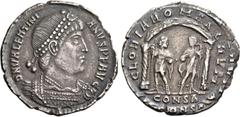 The Roman Empire Valentinian I, 364 – 375. Light miliarense, Constantinople 364-367, AR 3.67 g. Pearl-diademed, draped and cuirassed bust r. Rev. Two emperors standing facing, under two-columned arch,